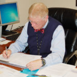 Judge Ginn at his desk