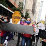 Wall Street march to make billionaires pay their fair share