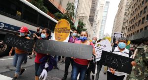 Wall Street march to make billionaires pay their fair share