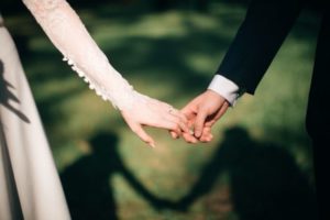 Bride & Groom holding hands