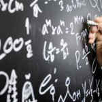 blackboard full of math