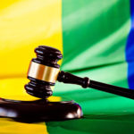 law-justice-gavel - lgbtq-flag-