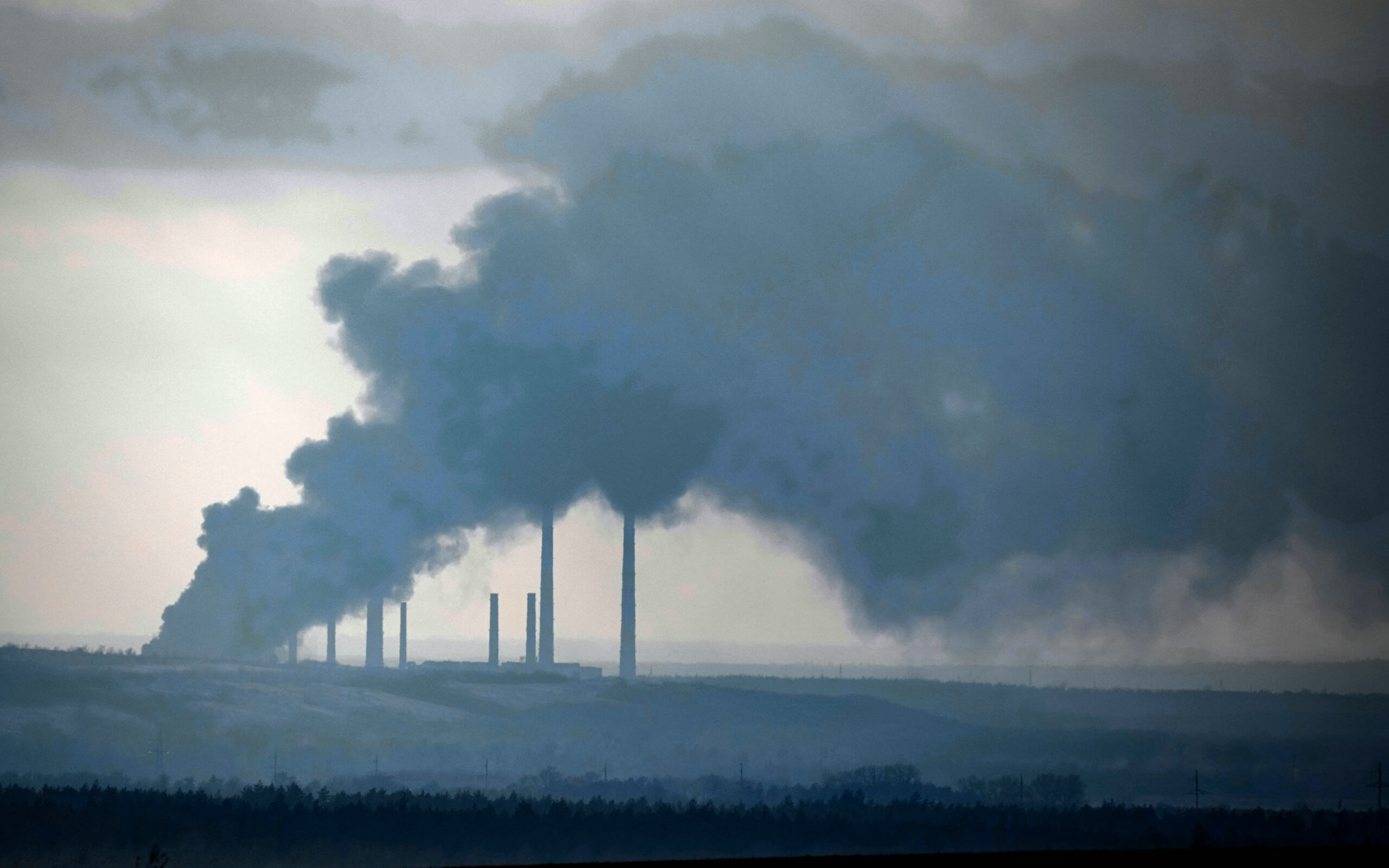 smoking shelled Ukrainian power plant