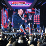 Putin speaks at concert