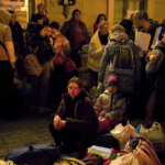 Ukrainian refugees wait