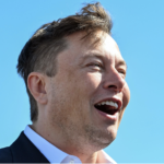Elon Musk smiles - blue sky