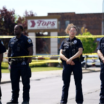 4 Police Officers outside Buffalo supermarket