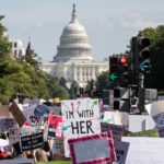 Progressive protesters march to US Capitol
