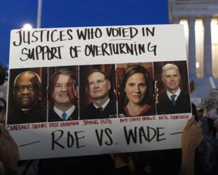 Protester poster listing conservative justices