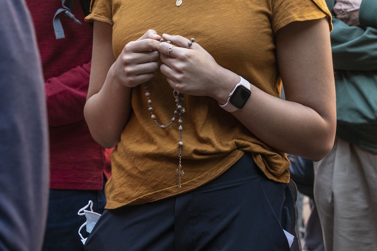 pro life protester catholic rosary