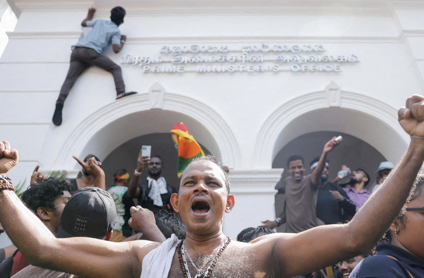 Demonstrators celebrate after the fall of Sri Lanka's govt.