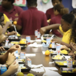 Children eating government school lunches