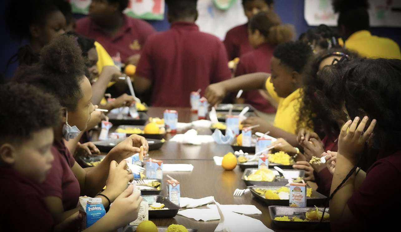 Children eating government school lunches