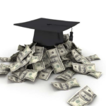 graduation mortar board on pile of money