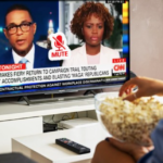 watching CNN eating popcorn