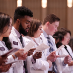 Medical school students recite oath