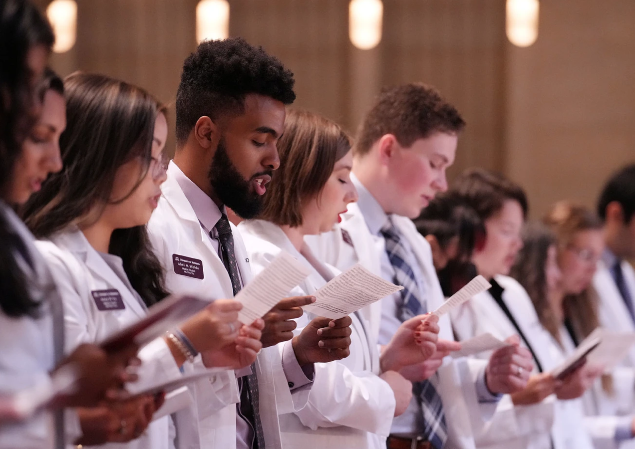 Medical school students recite oath