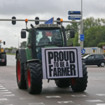 Tractor with sign-Be a Proud Farer