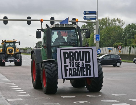 Tractor with sign-Be a Proud Farer