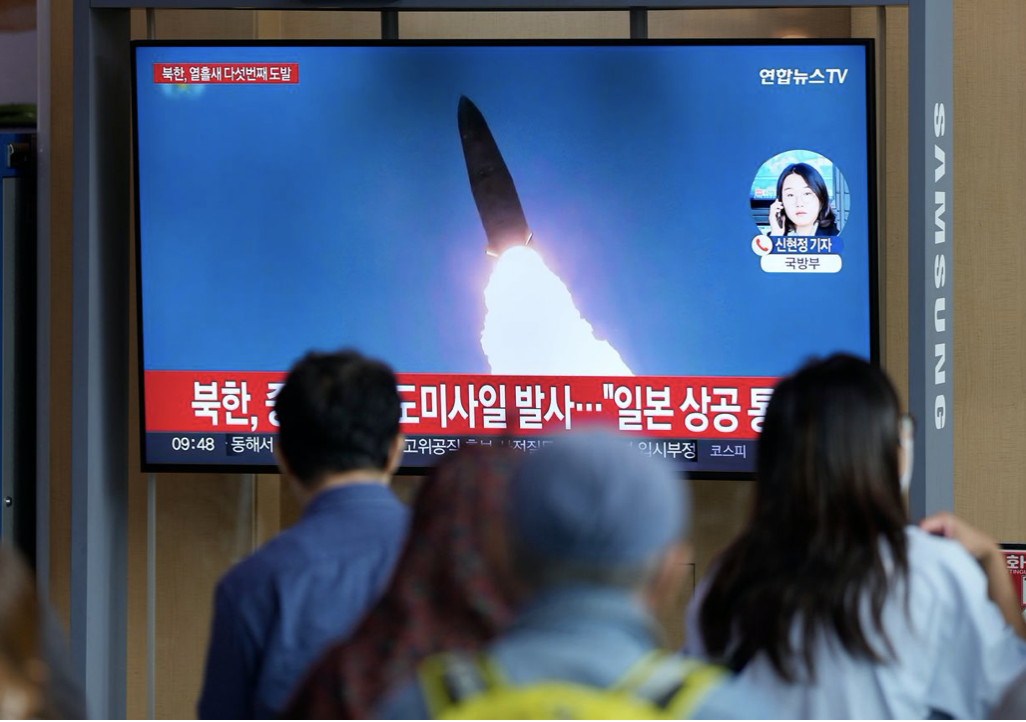 TV screen-shot of N Korean missle launch