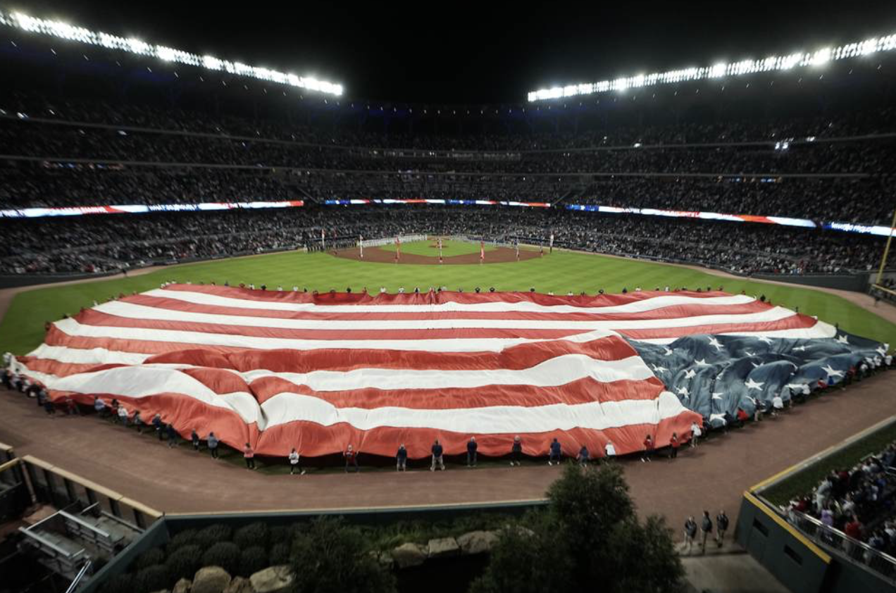 US Flag spread out on Baseball Outfield