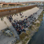 hundreds of illegal immigrants line up at border soldiers monitor
