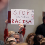 CRT protester at school board meeting