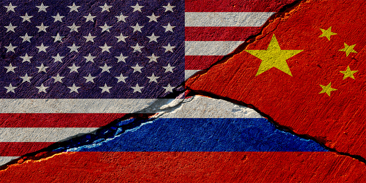 US China Russia painted flags on broken stone.png