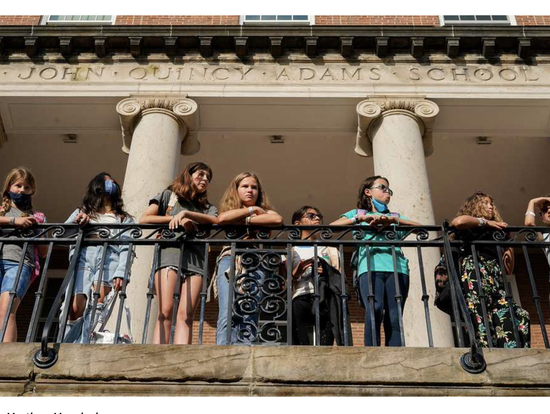 Students on balcony at John Quincy Adams School
