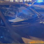 smashed windshield after teen riot in Chicago