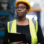 woman hard hat work clipboard