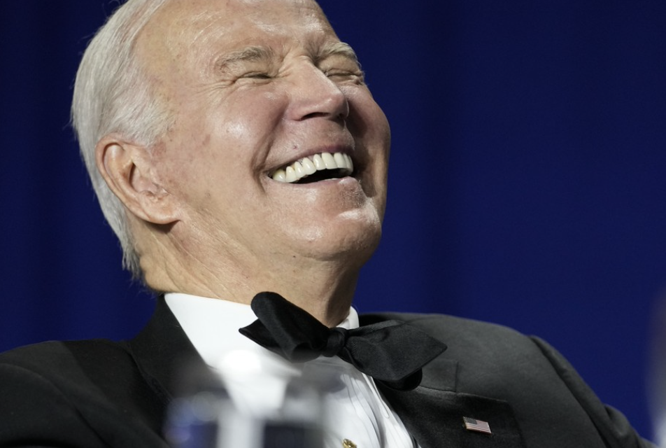 Biden head thrown back laughing