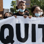 Young protesters march for justice system reform and equity in education in Portland, Ore