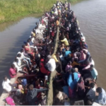 Sudanese Refugees in a boat