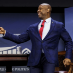 Pres candidate Tim Scott smiles