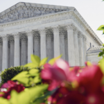 Supreme court building w flowers - SCOTUS