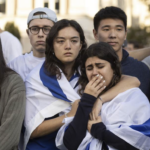 Israeli families mourn wrapped in Israel's flag