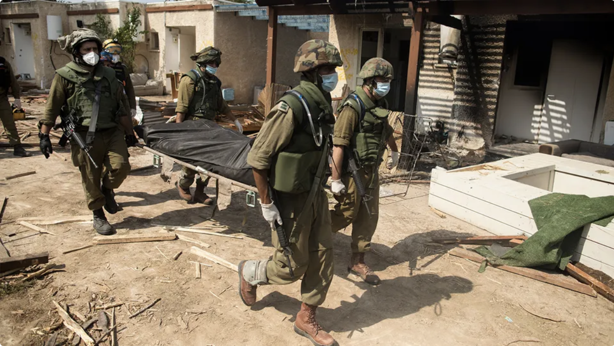 Soldiers remove civilian in KFAR AZA, ISRAEL