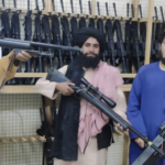 Taliban fighters display US Weapons in Afganistan