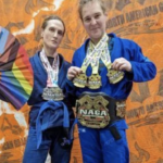 2 transgender male athletes show meadals won as women