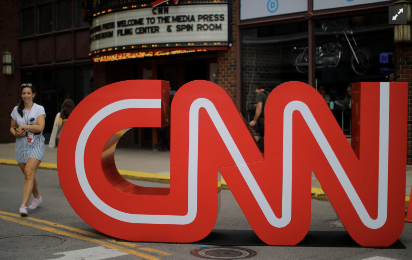 The CNN logo stands outside the venue of the second Democratic 2020
