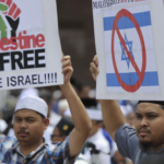 protesters - I hate israel - eliminate israel - signs