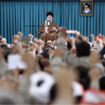 Iranian Supreme Leader Ayatollah Ali Khamenei being hailed