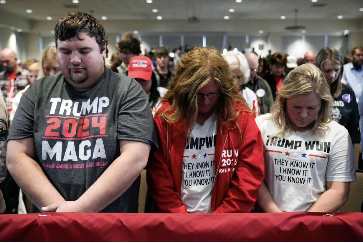 Trump supporters praying