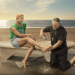 Priest washes roller-skaters feet