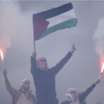 Pro Hamas protesters flares smoke - antisemitism