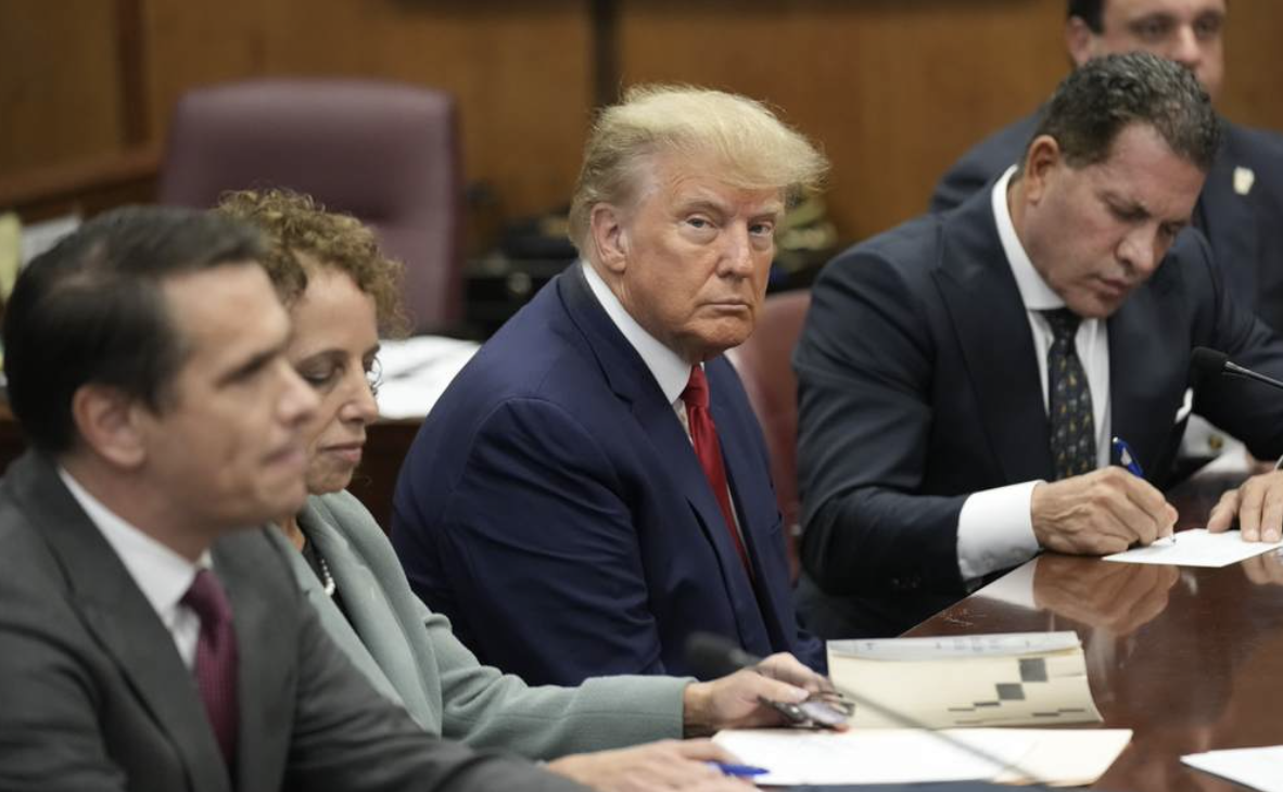 Trump sits in NY Courtroom