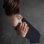 school age boy praying inset in outline of CA