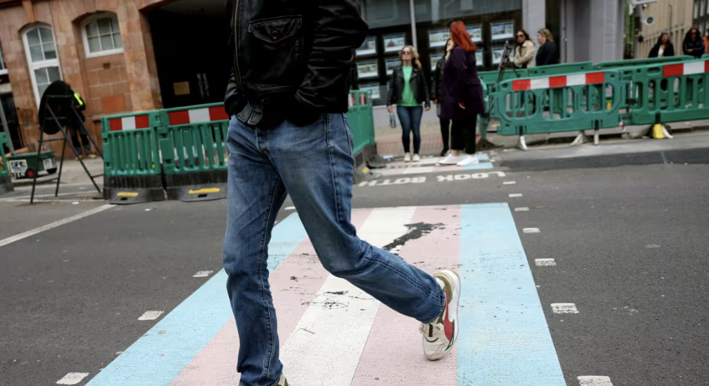 European crosswalk painted with transflag stripes