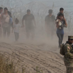 Illegal immigrants cross into TX - dusty road
